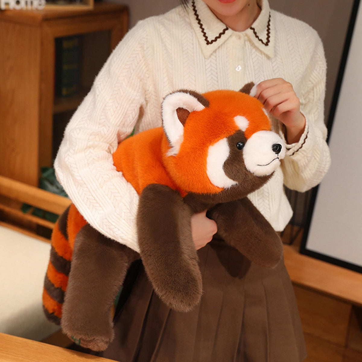 Ditucu red panda stuffed animal with realistic design and big eyes for cozy hugs.