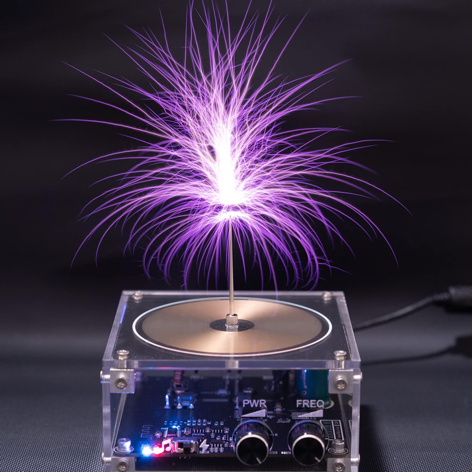 Divvlur Tesla Coil lightning dance captures dramatic arcs during operation.