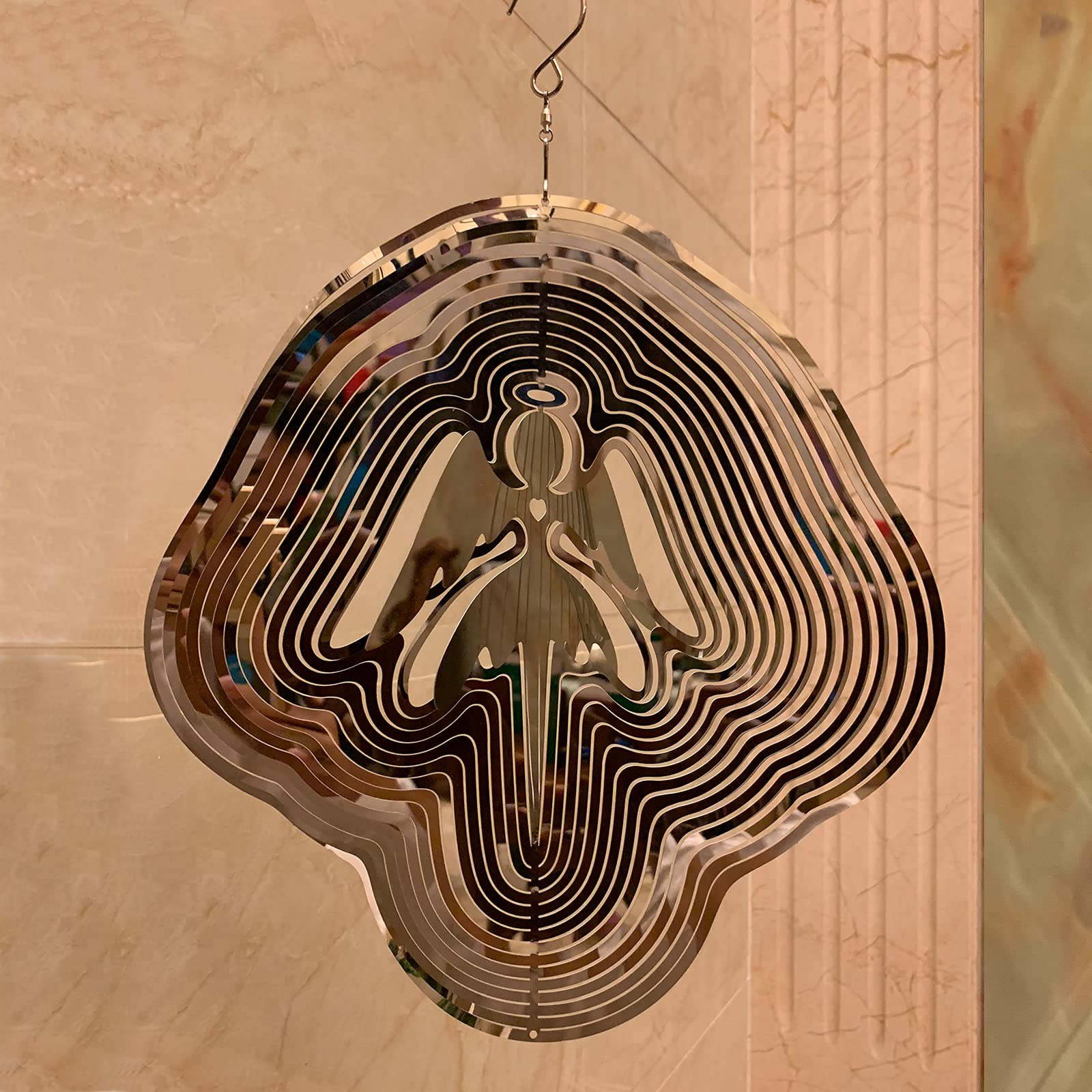 DJUAN mirror-reflection angel wind spinner creates dynamic light effects