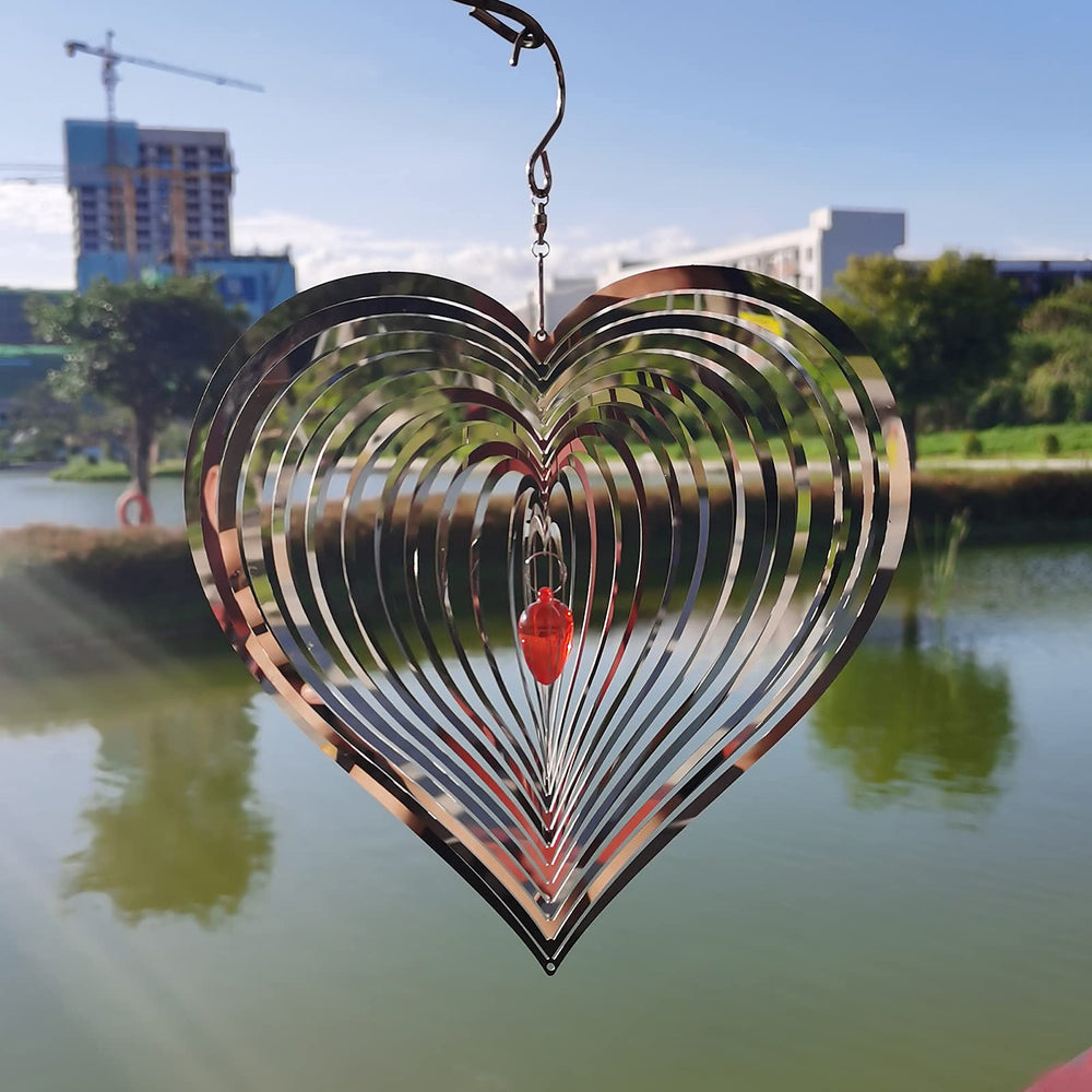 DJUAN garden wind spinner hooks on trees, walls, or rails.
