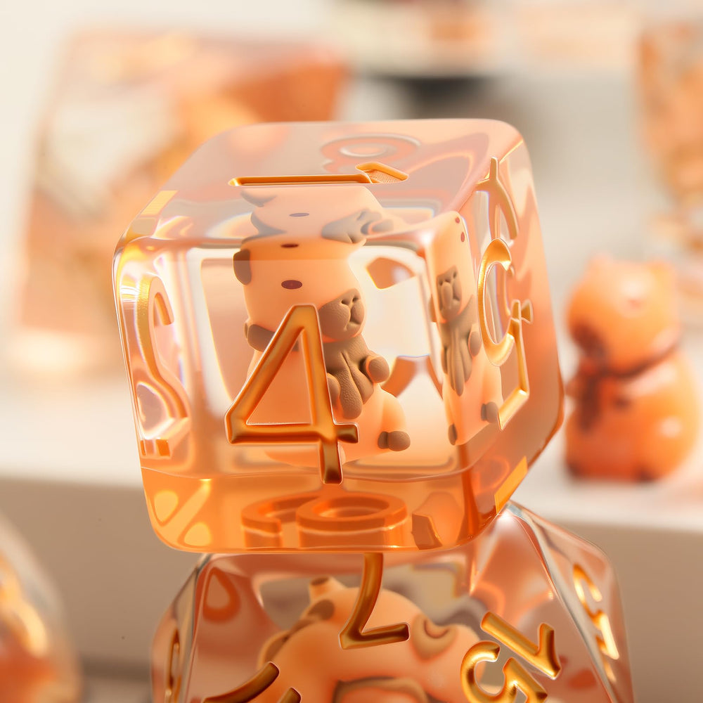 DNDND Capybara D12 dice with gold numerals for bold rolls.