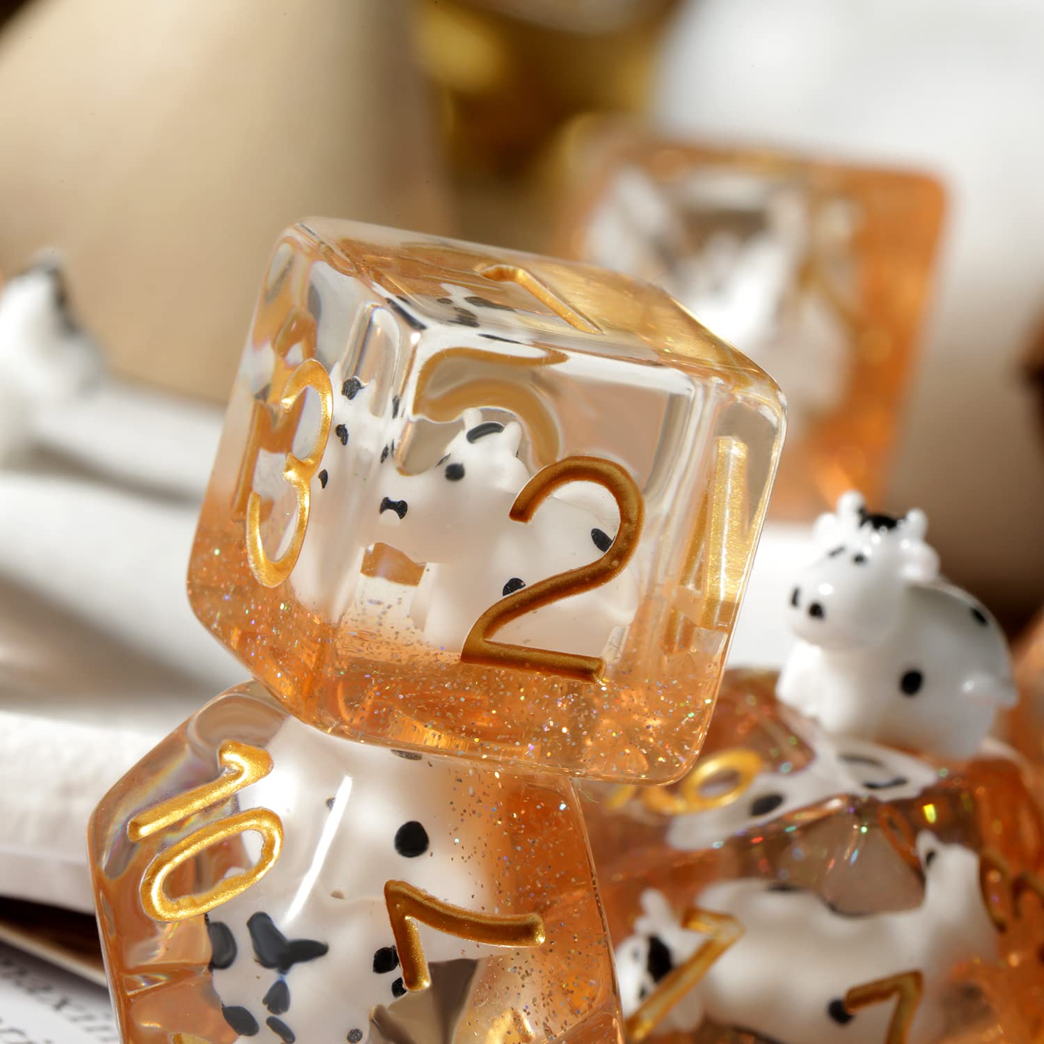 DNDND cow D12 close-up reveals charming cows inside resin.