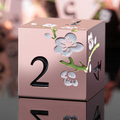 DNDND flower metal dice set with gold and white petals, ideal for tabletop RPGs