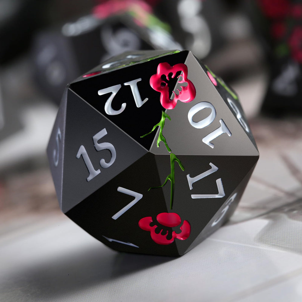 DNDND flower metal dice D10 in matte black with pink flower, smooth throws.