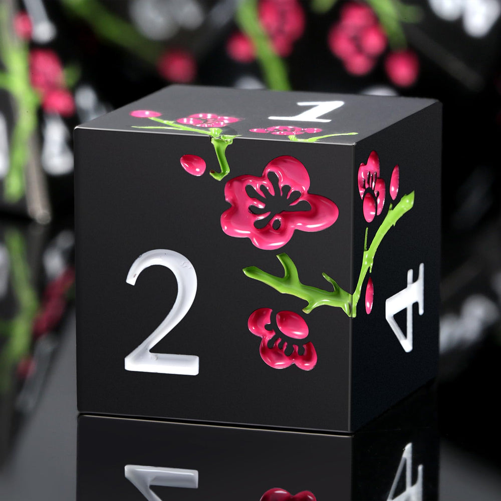 DNDND flower metal dice D4 in matte black with pink flower, ideal for reliable RPG rolls.