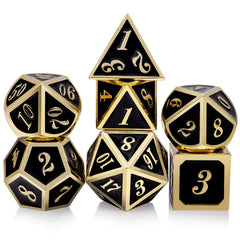 DNDND metal dice set black and gold D20 close-up highlighting the premium finish.