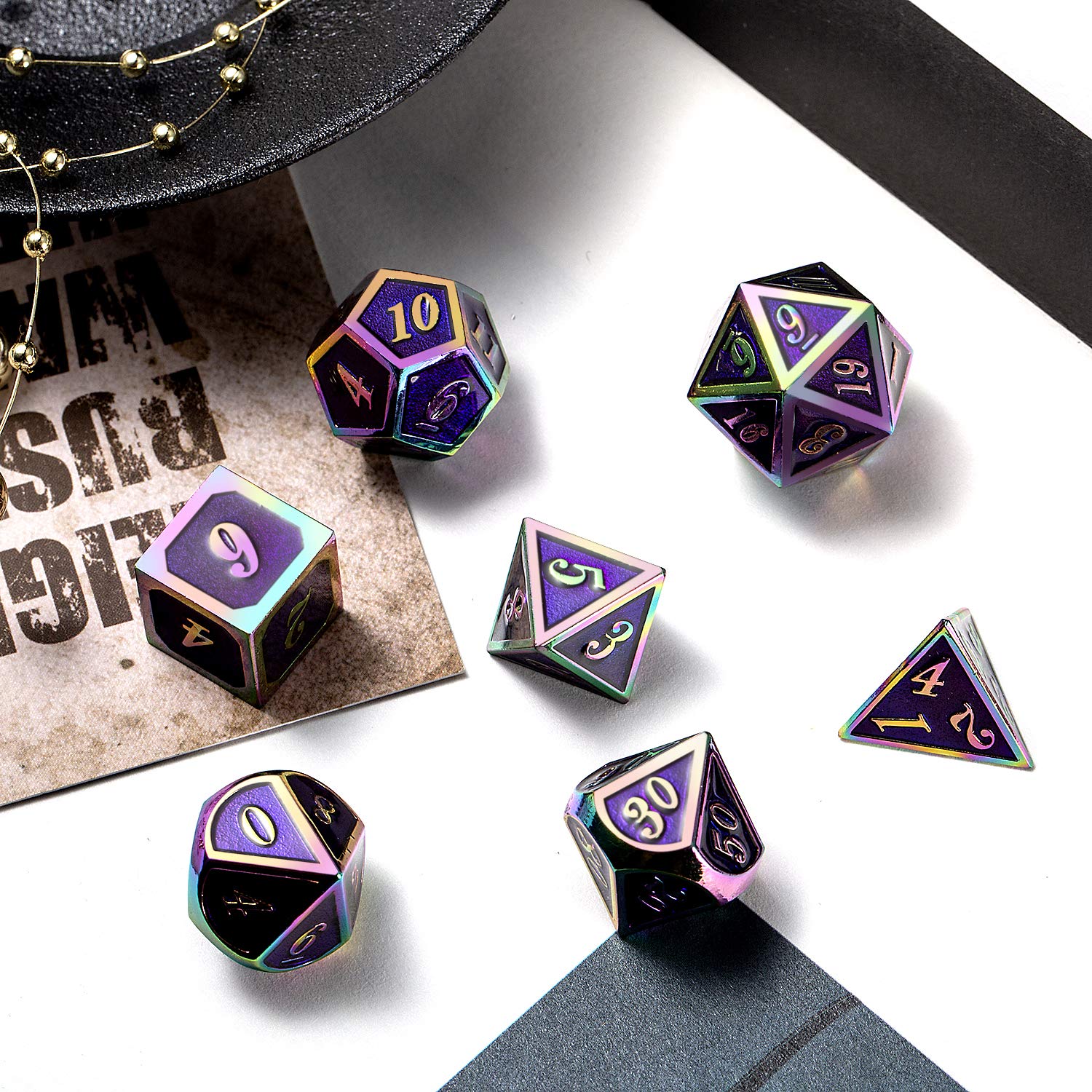 DNDND purple metal D20 die highlighted by a rainbow frame on a gaming table