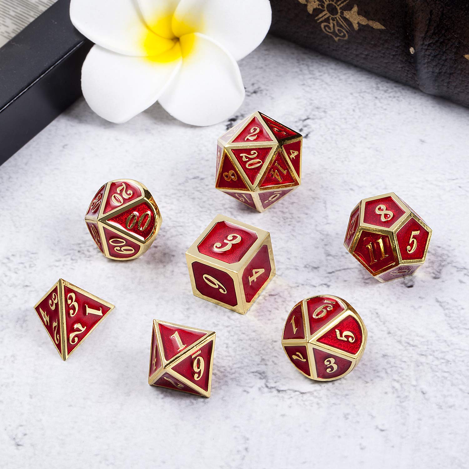 DNDND ruby red D20 die highlights durable zinc alloy construction.