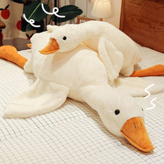 Doireum Swan weighted plush pillow on sofa used for cozy support
