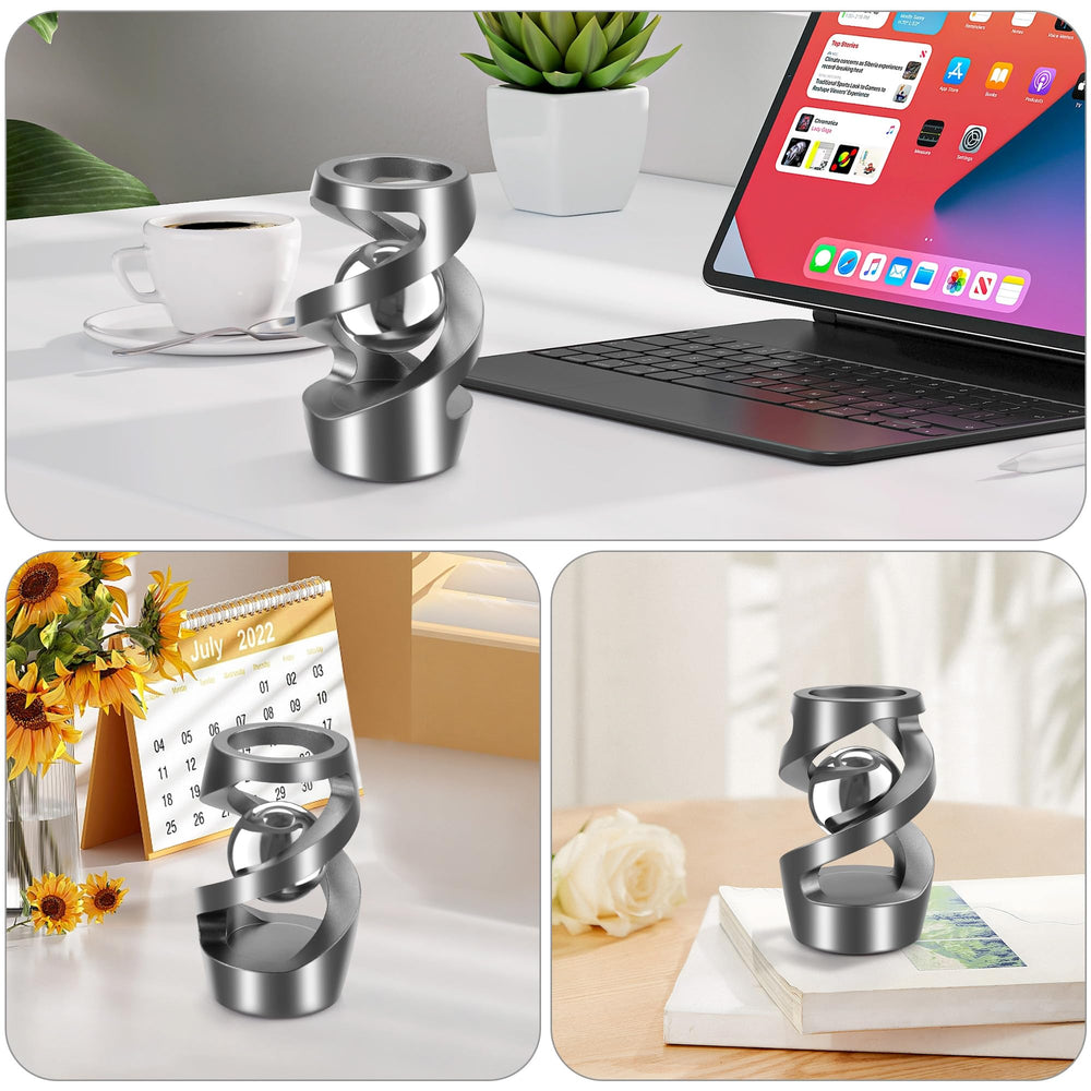 Dolasev kinetic desk toy hand grip detail highlighting rounded CNC edges