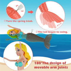 Dollbie wind-up mechanism with flapping tails demonstrating battery-free play