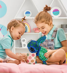 DolliBu blue sea turtle plush in playful pose for imaginative playtime