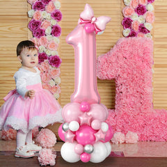 Domgoge mini pink bow foil balloon for cute accent details.