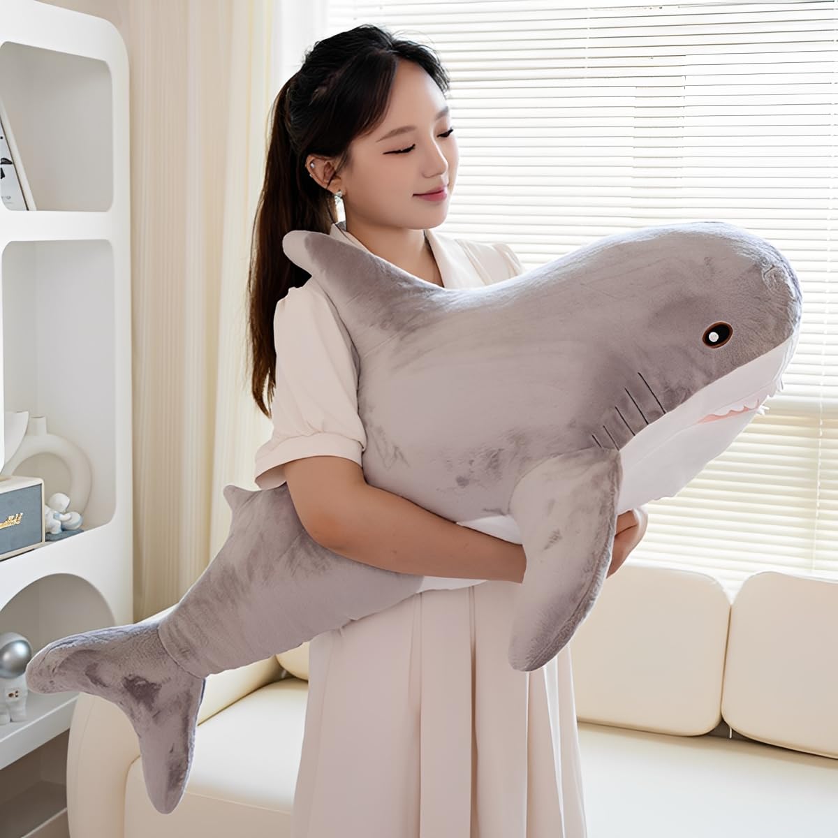 DongAi shark pillow closeup fabric shows soft two-tone plush.