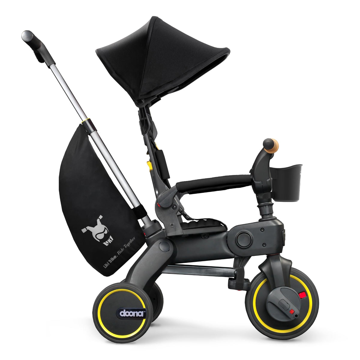 DOONA Liki Trike S5 Nitro Black folded for easy stowage on trips