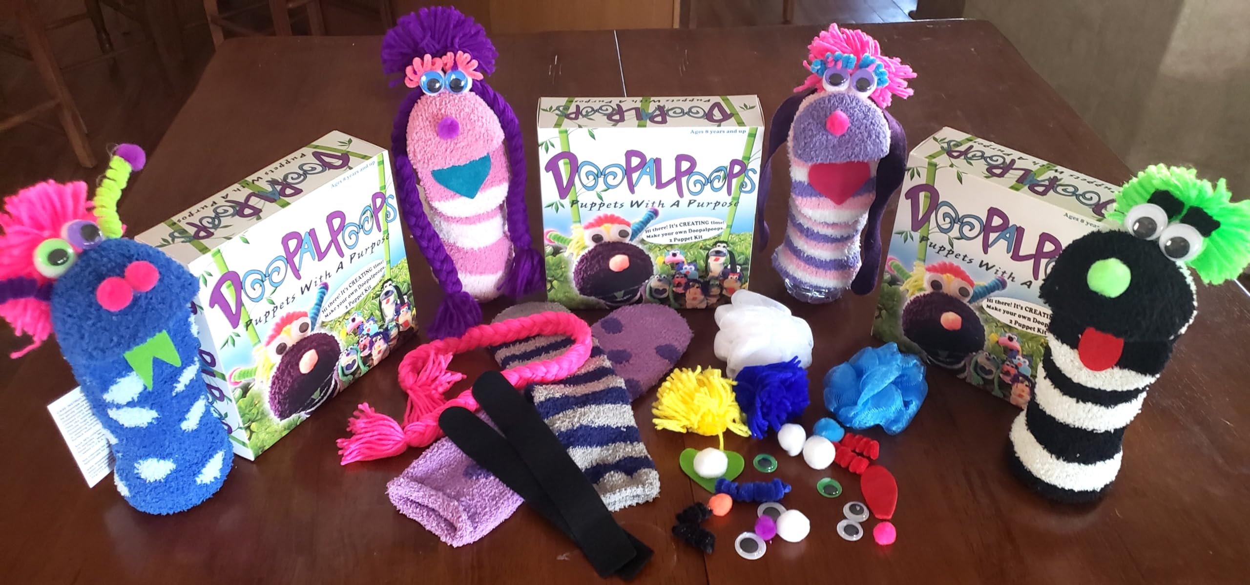 Socks, mouthpieces, eyes, noses, and more laid out for quick setup