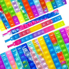 DOPWQAA silicone pop bracelet closeup highlighting soft, wipe-clean material.