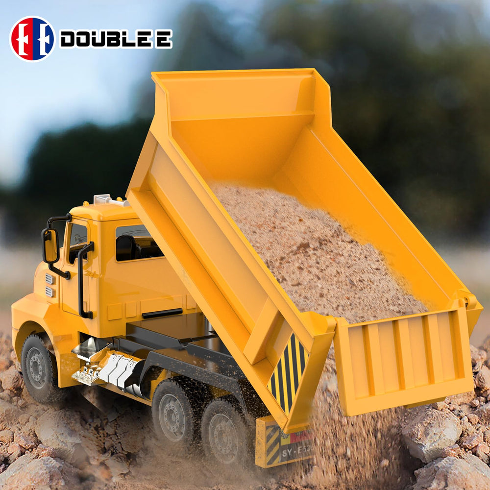 DOUBLE E Mack RC Dump Truck 4WD motor tackles outdoor terrain.