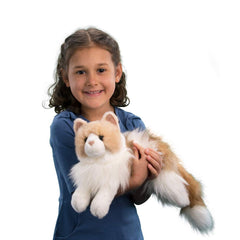 Kiki's long soft coat enhances realism for pretend-cat scenes.
