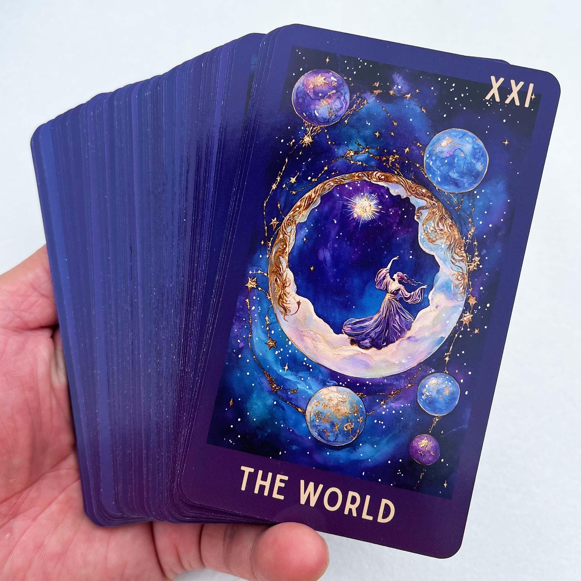DPEHAKMK Celestial Tarot starfield background supports focused divination.