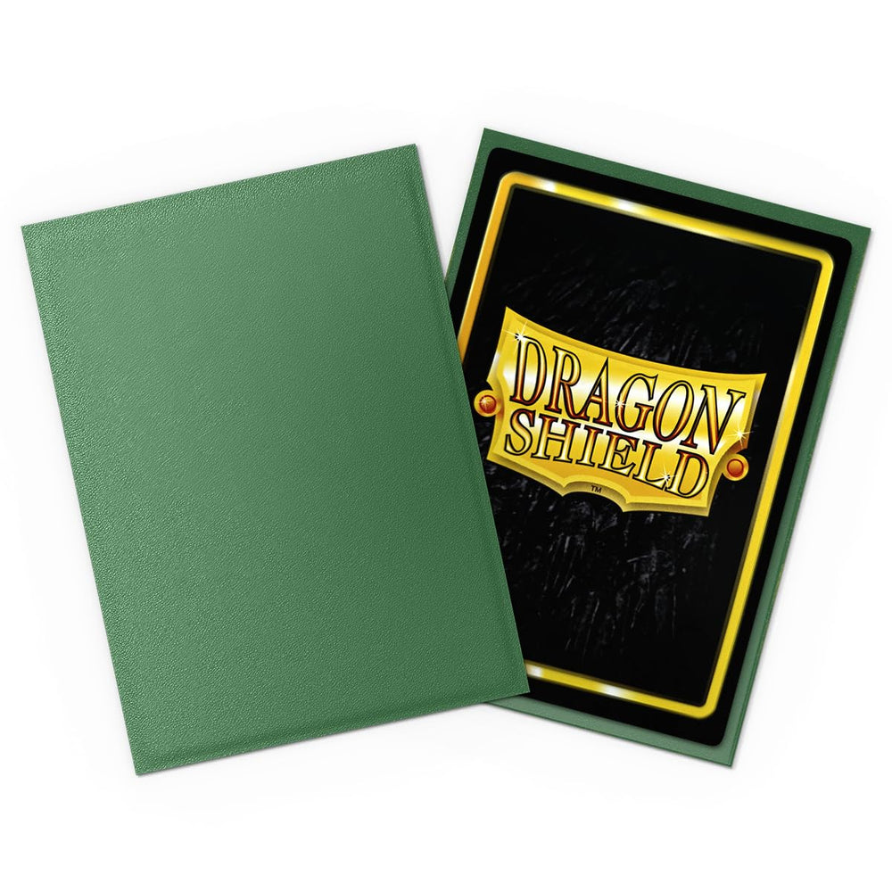 In-hand view of Dragon Shield 100-count pack ready for play.