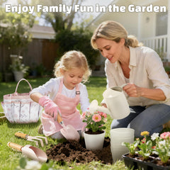 Dreamon pink garden apron keeps clothes clean while young gardeners dig.