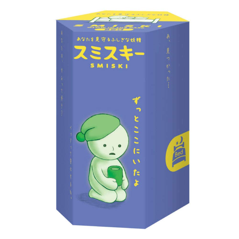 Dreams Smiski glow-in-the-dark figure resting beside the bed for a soft nightlight