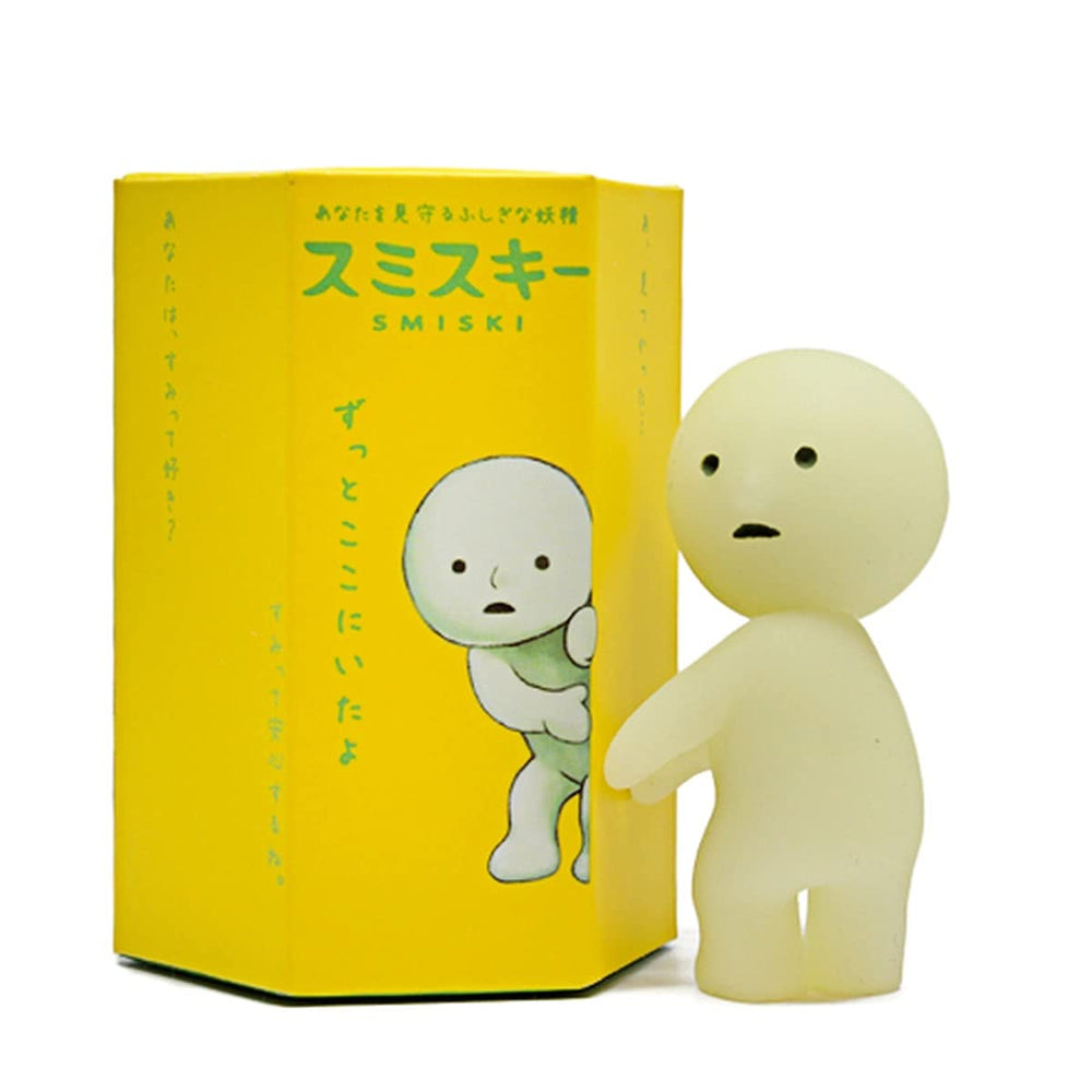 Dreams Smiski Series 1 glow-in-the-dark figure in a blind box for night-time intrigue.