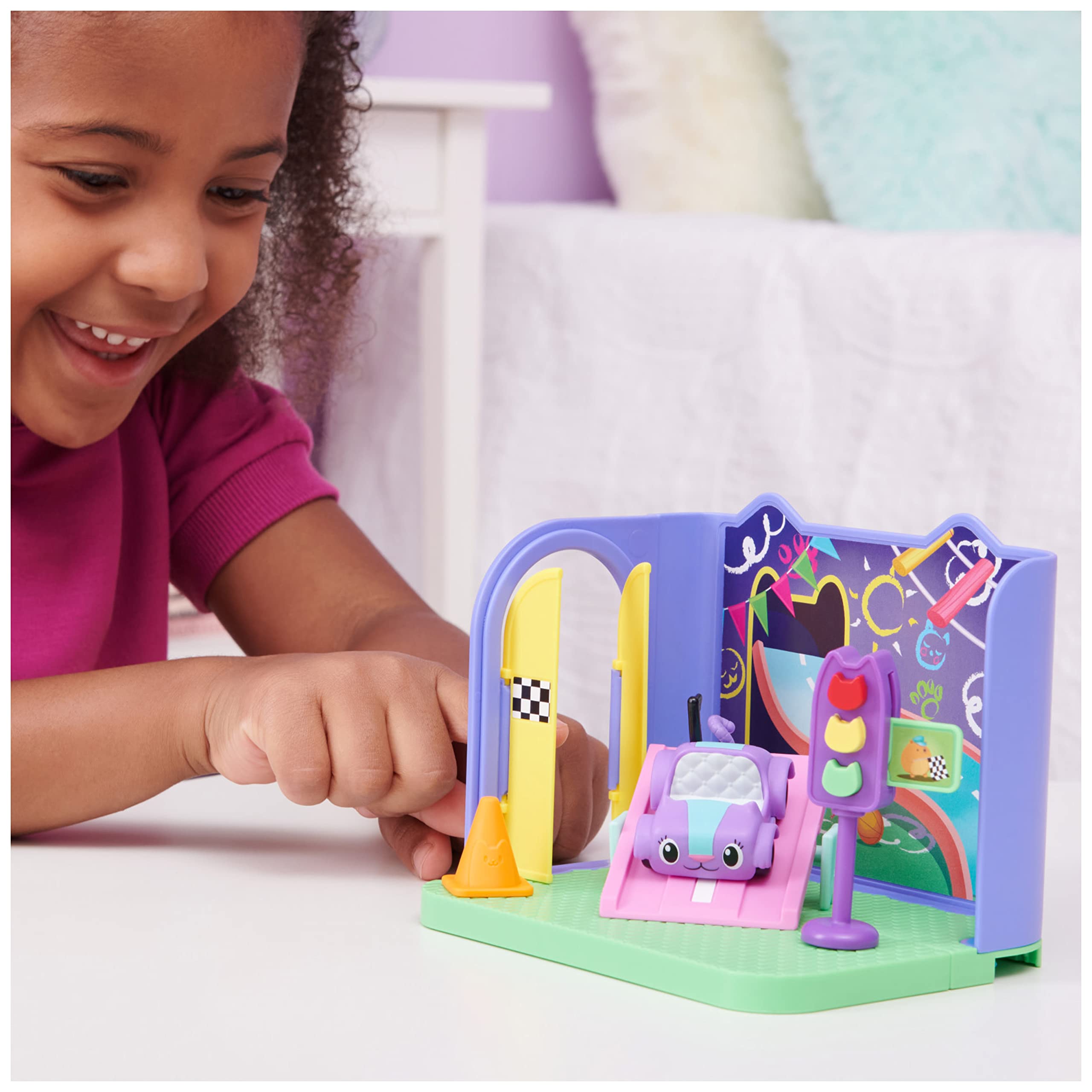 DreamWorks Gabby’s Dollhouse Ramp Bed and Stoplight enhance city play.