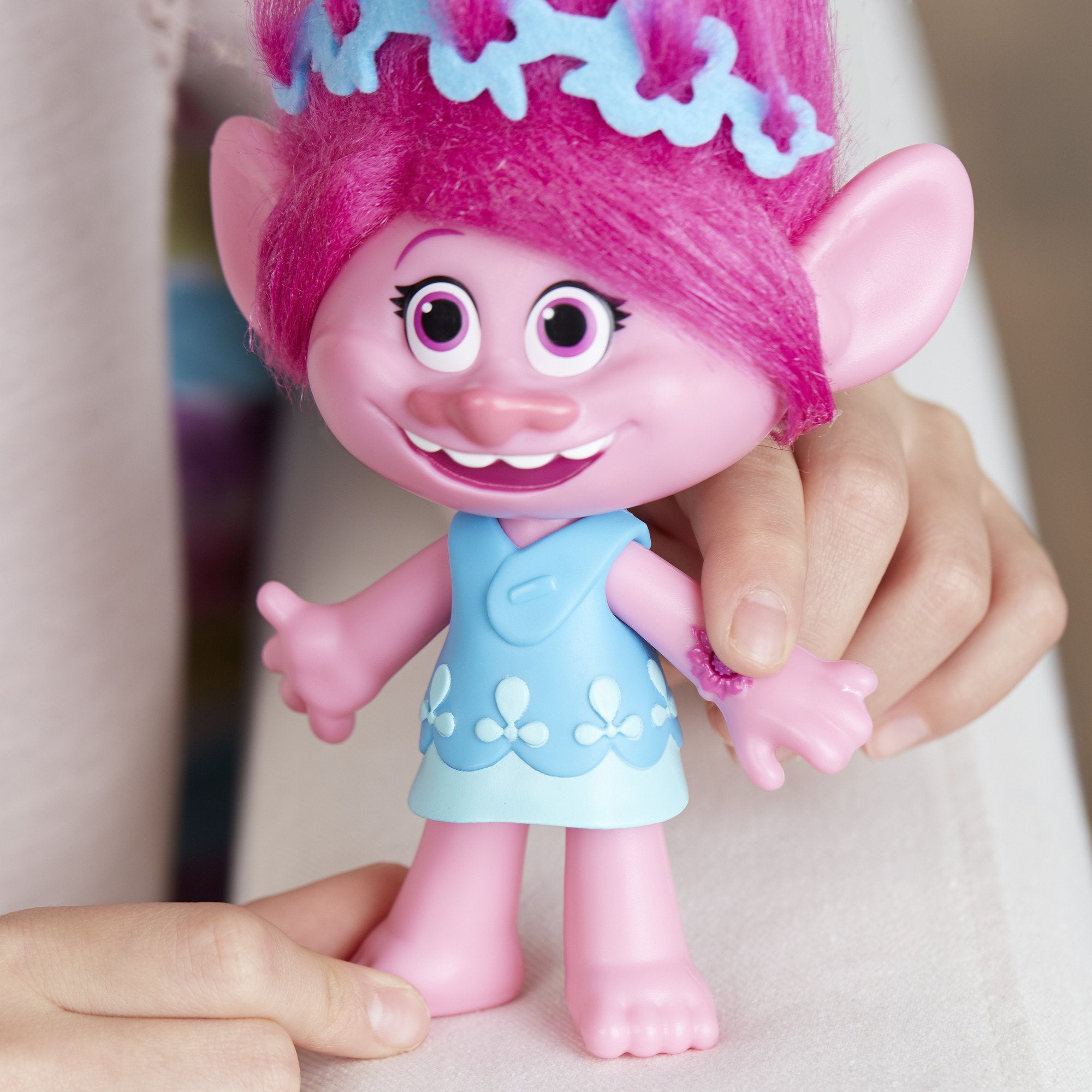 Shelf-friendly pose and vibrant colors for display with Trolls figures