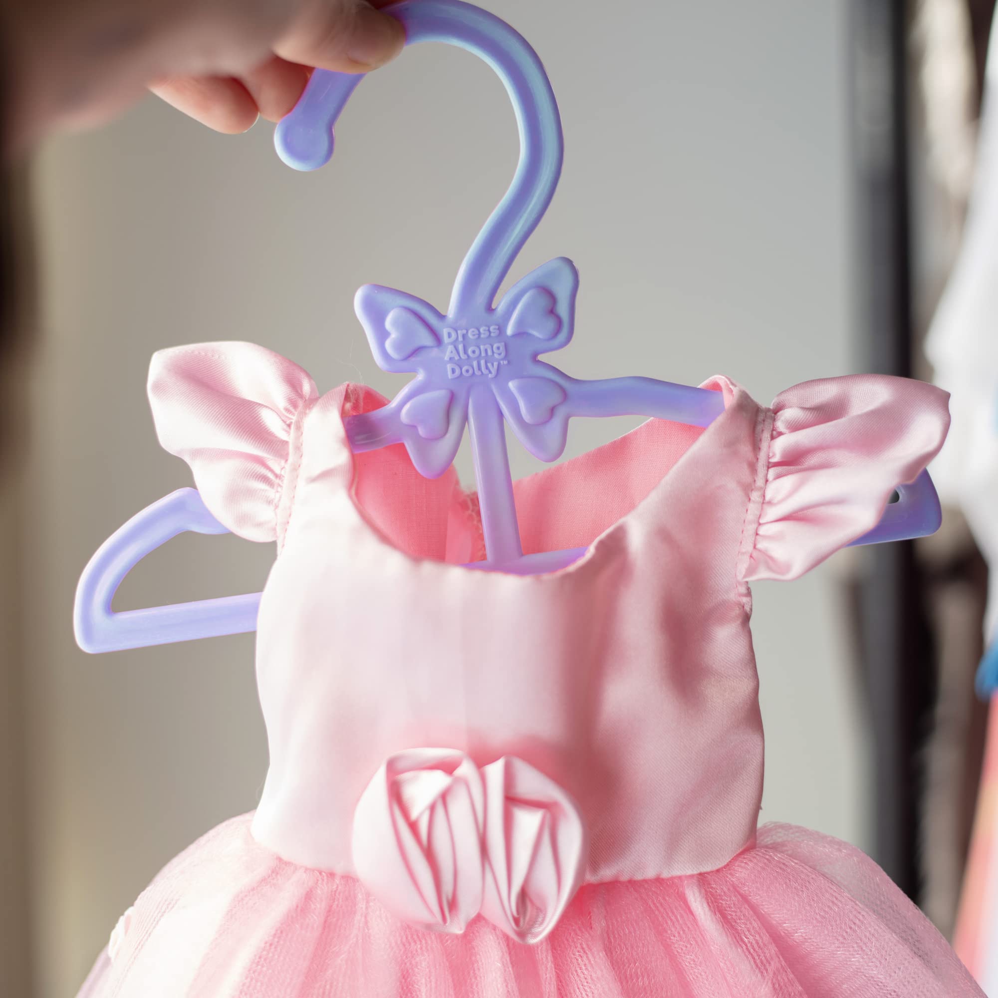 Dress Along Dolly doll closet organization helps keep favorite pieces together.