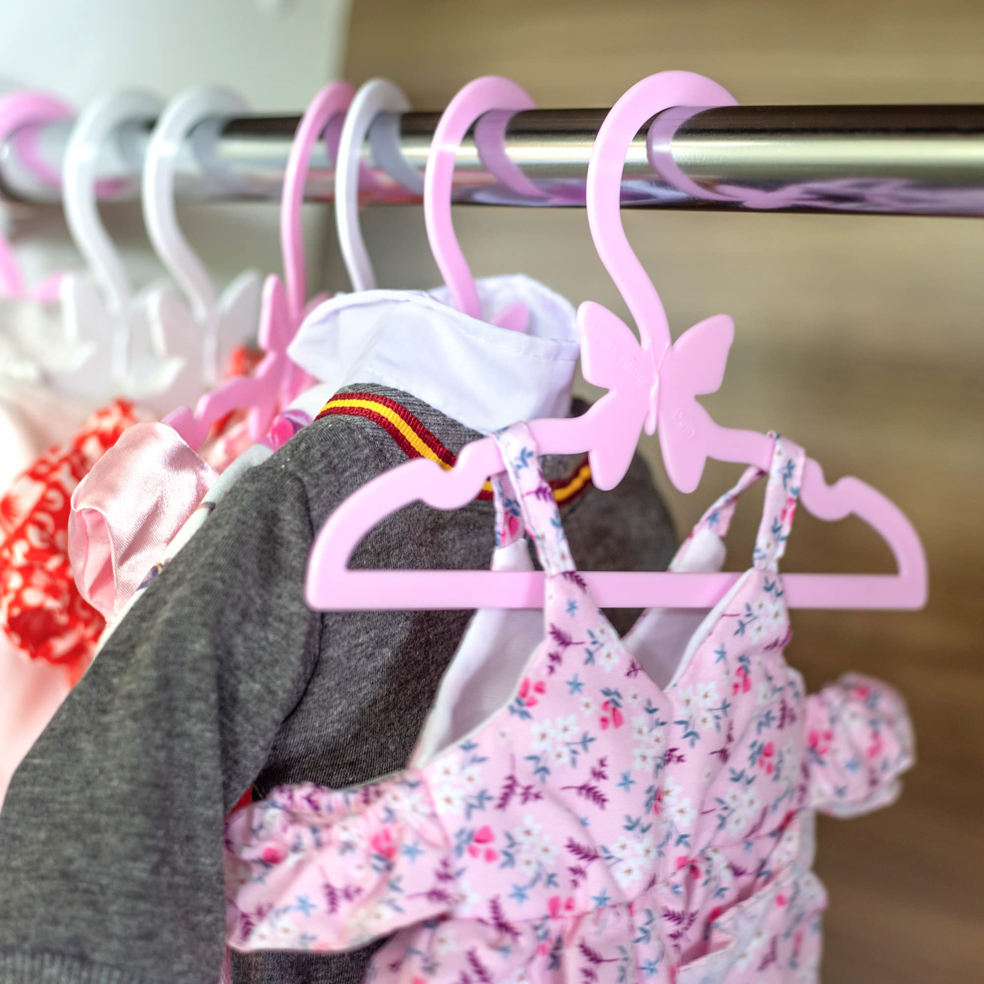 Dress Along Dolly doll clothes hanger collection for organized play