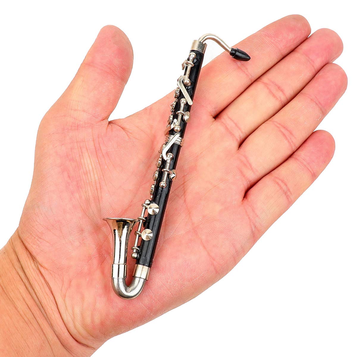 Dselvgvu miniature bass clarinet in red velvet case for safekeeping