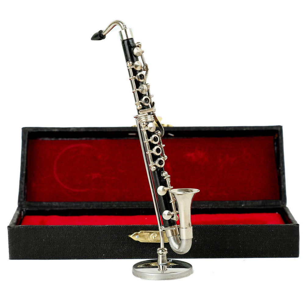 Dselvgvu miniature bass clarinet showing nickel plated keys on display