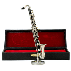 Dselvgvu miniature bass clarinet showing nickel plated keys on display