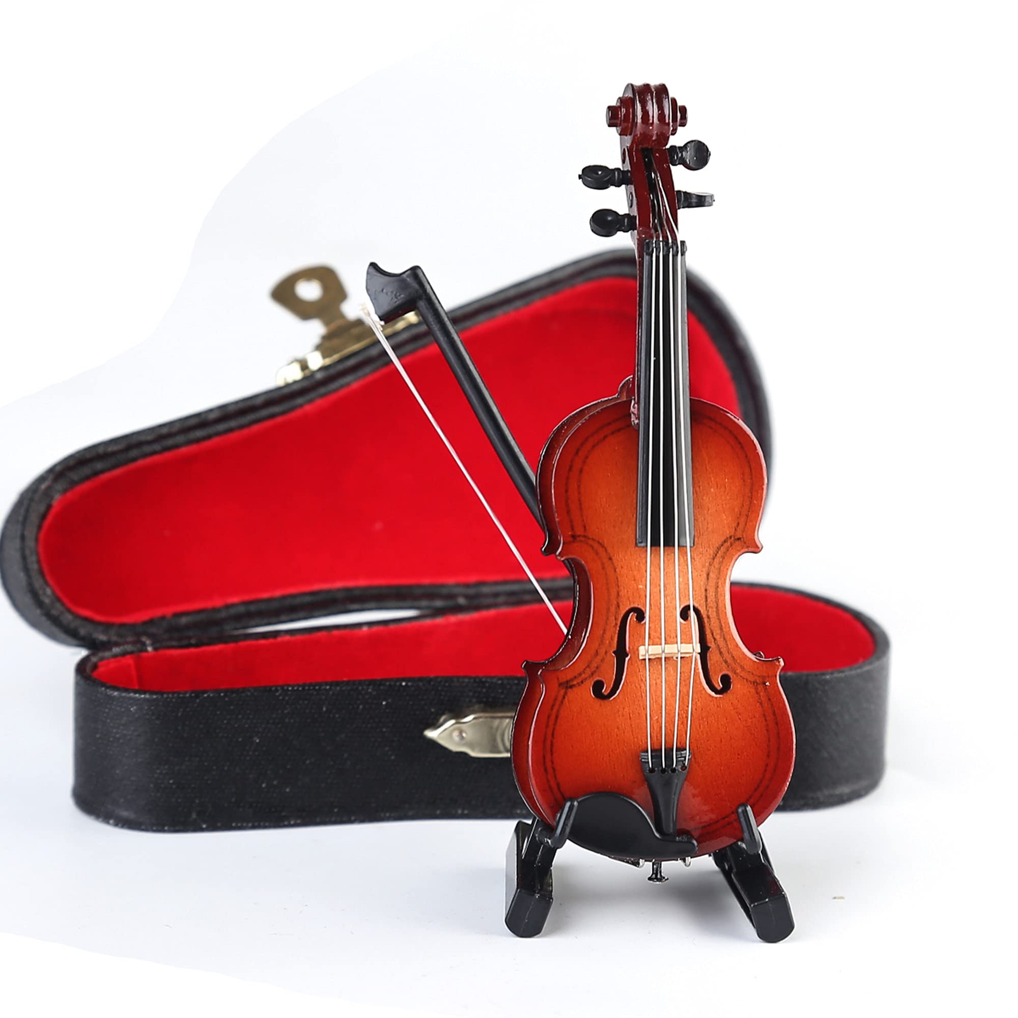 Dselvgvu miniature violin on desk provides tasteful musical accent.