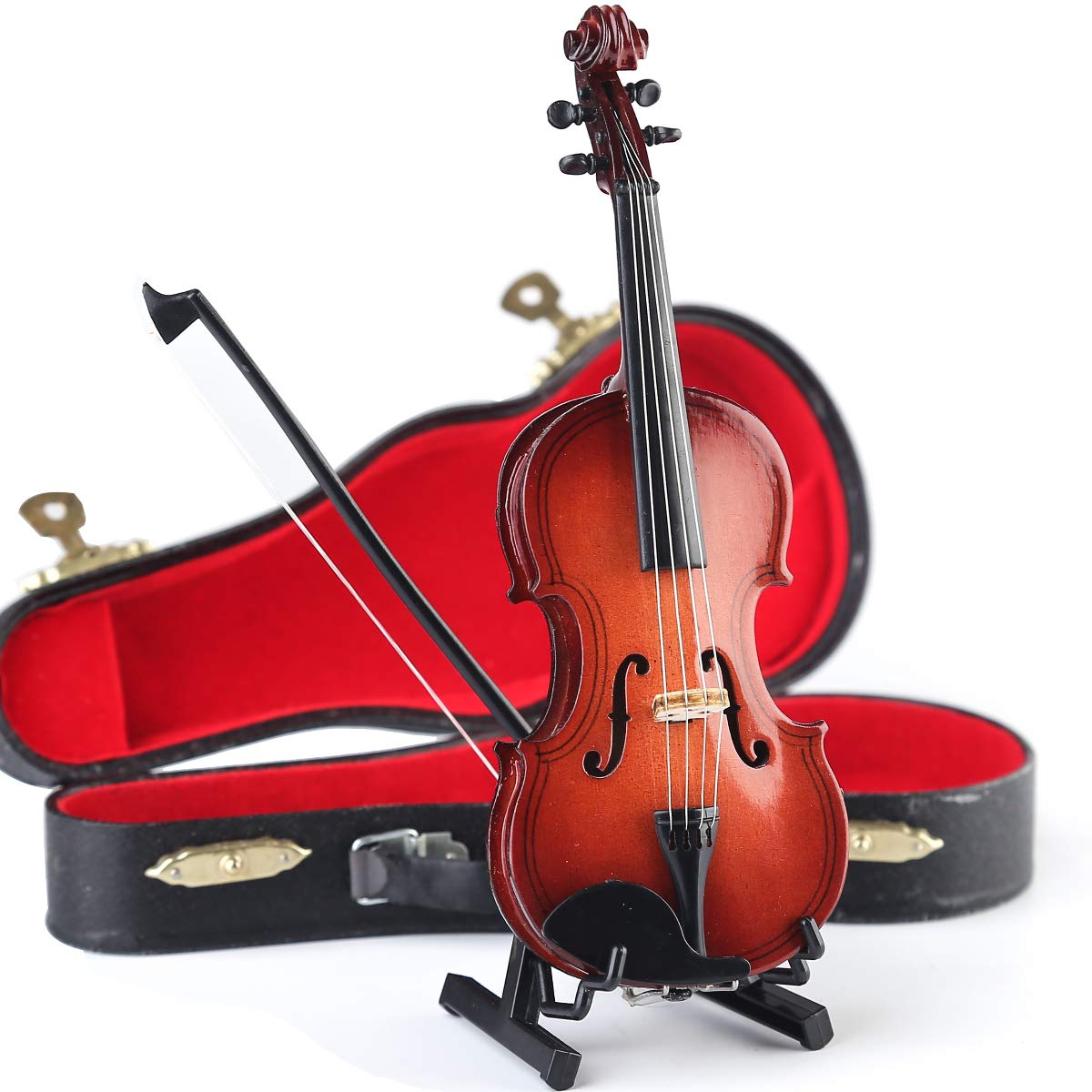 Dselvgvu violin replica on bookshelf as tasteful home decor accessory.