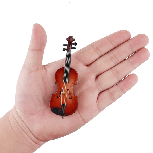 Dselvgvu miniature violin with bow shows polished wood and display-ready charm.