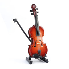 Dselvgvu wooden violin ornament with smooth finish enhances room decor.