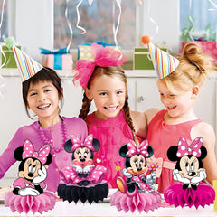 DSOE Minnie honeycomb centerpiece pairs with other decor for cohesive party visuals.