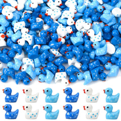 DTOFOOT 200Pcs dark blue winter resin ducks with snowflake pattern for festive decor.