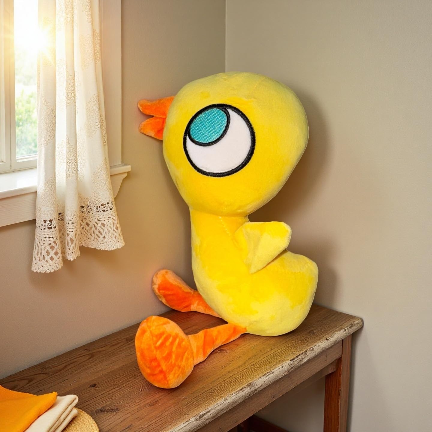 Duckling Plush with realistic yellow design, cheerful playtime