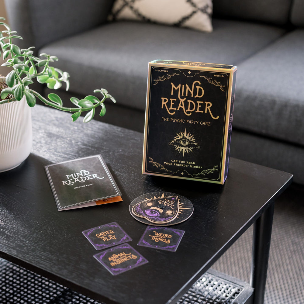 DYCE Mind Reader game pieces neatly arranged in the box.