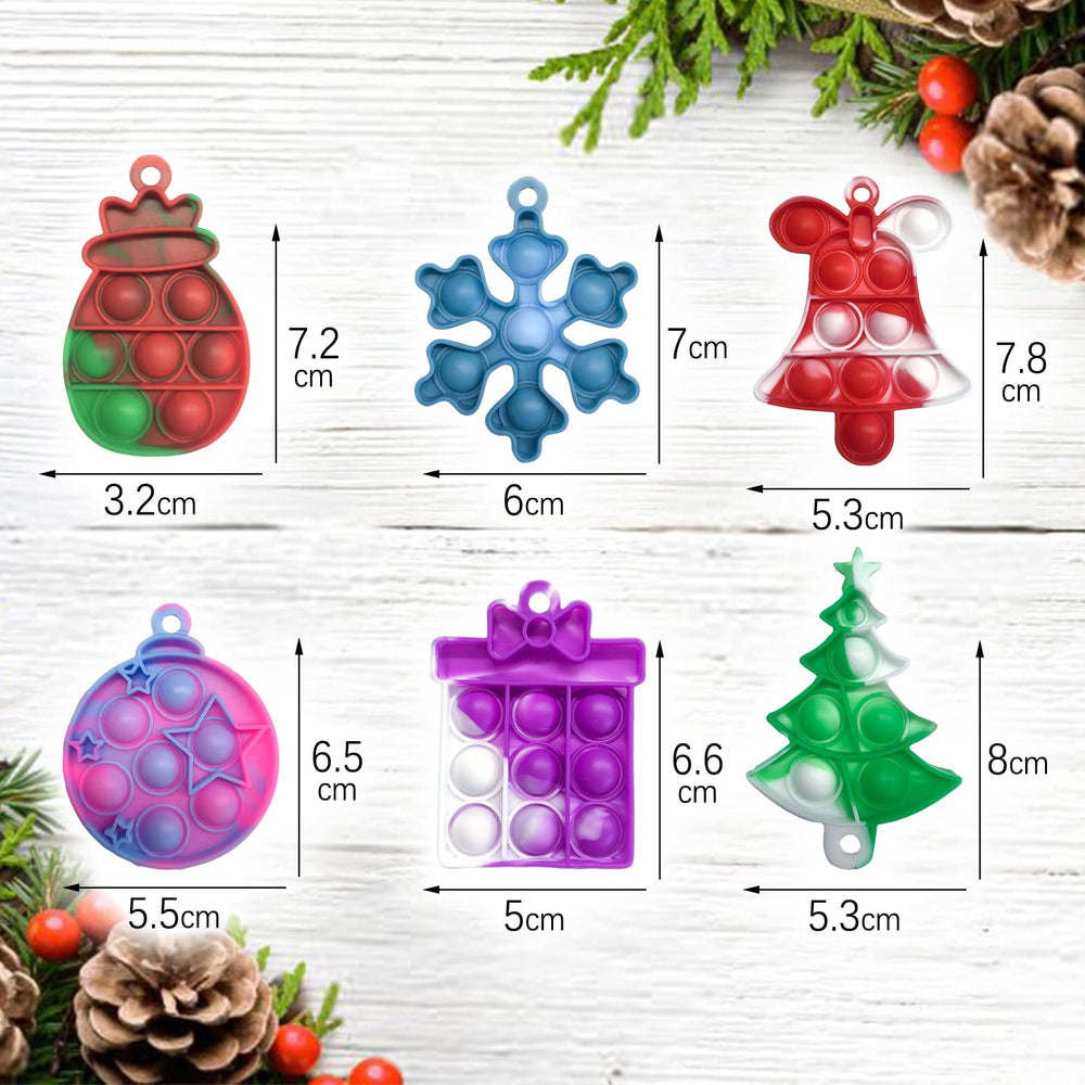 DZLUSJ Christmas mini pop keychain silicone close-up highlighting soft, durable silicone material.