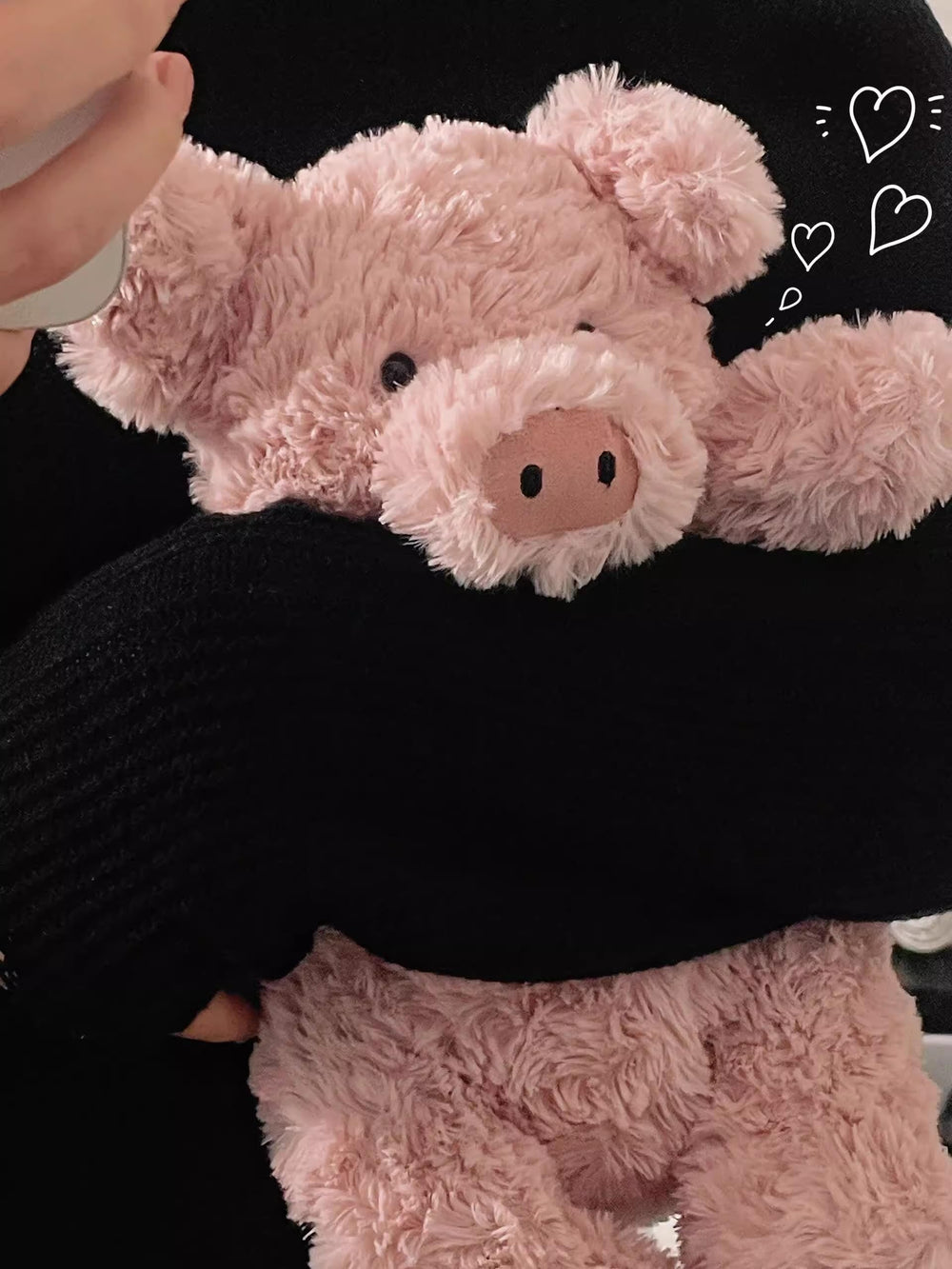 Adorable floppy paws on EASELR pig plush enhance playtime.