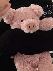 Adorable floppy paws on EASELR pig plush enhance playtime.