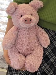 Bright pink EASELR pig plush adds color to kids’ rooms.