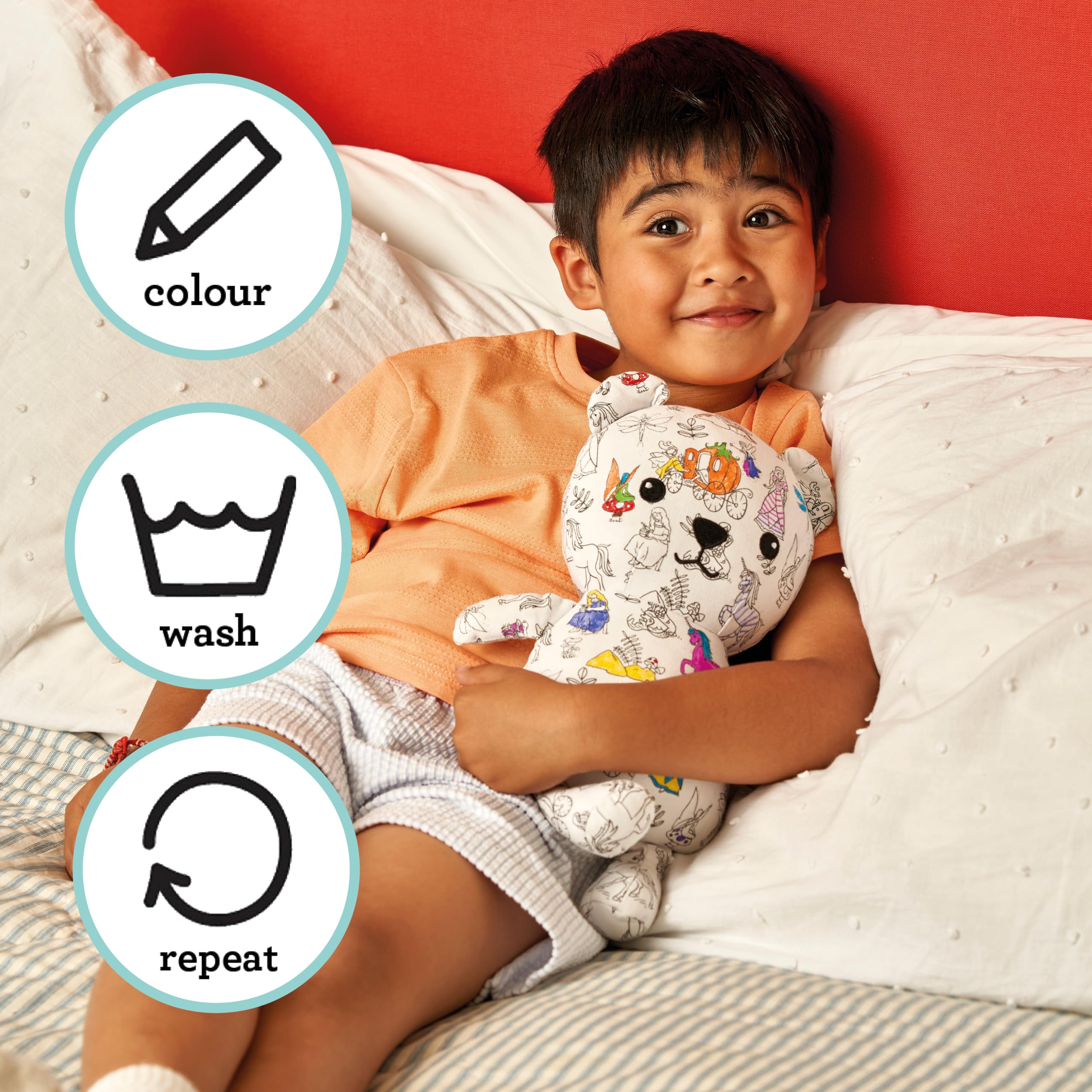 Reusable plush bear designed for washing and re-coloring after color changes.