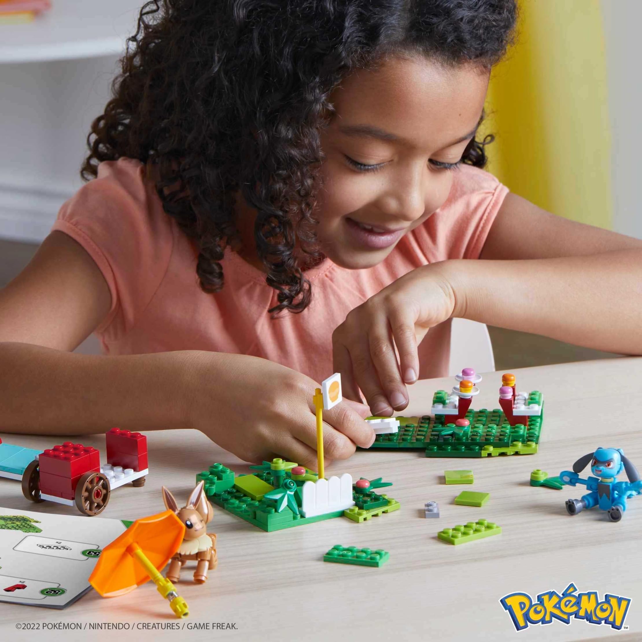 Eevee-Riolu buildable food stand encourages storytelling and fine motor skill development.