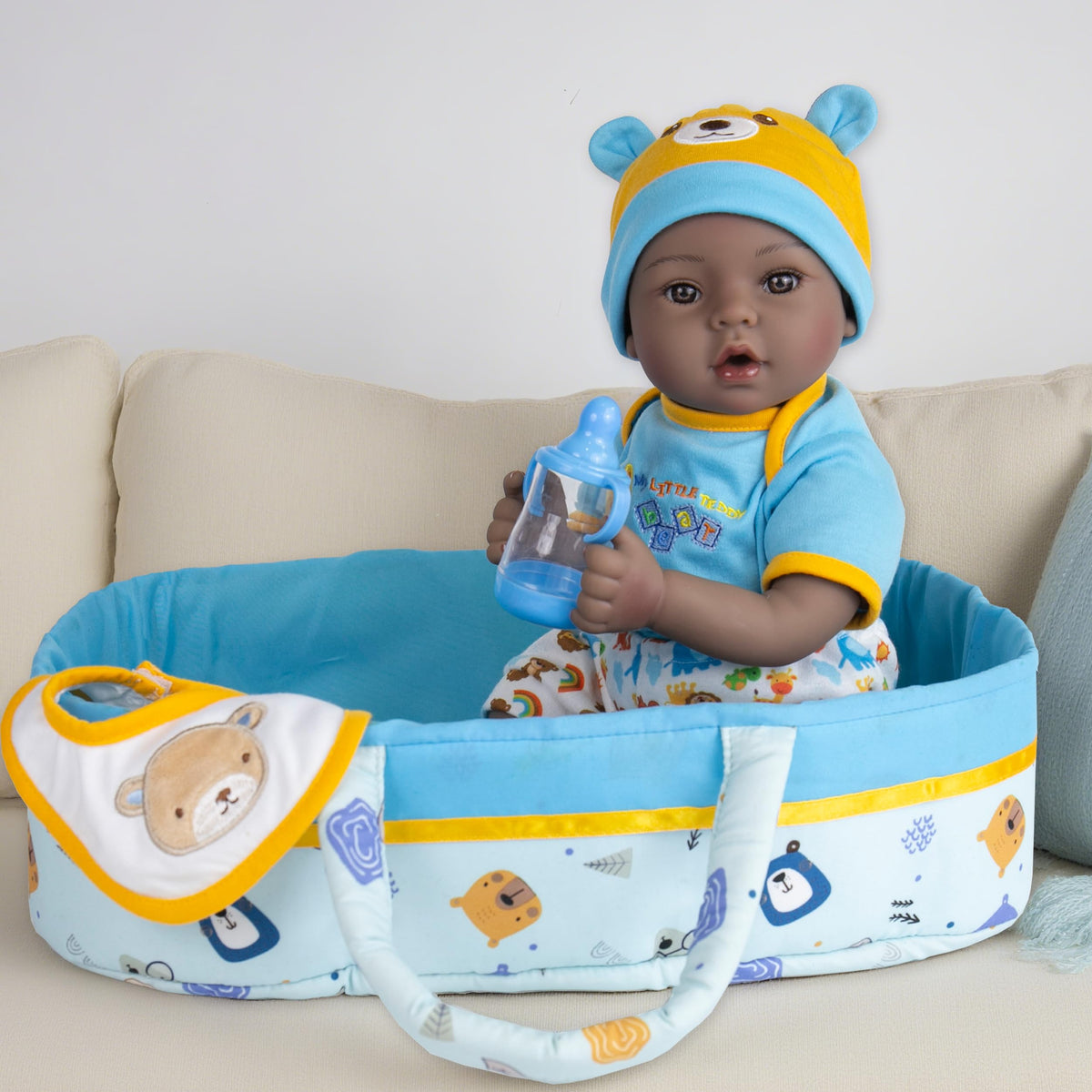 EKOKIZ Colin doll in arms, lifelike cuddle-friendly pose for imaginative play